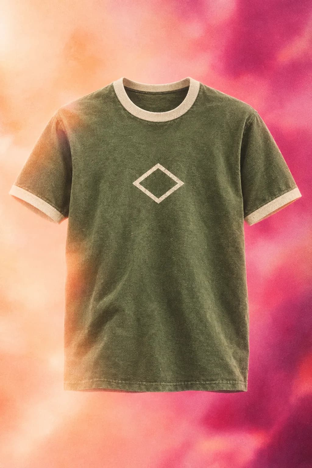 Olive garment-dyed ringer tee with a cream diamond print on a peach-magenta wash