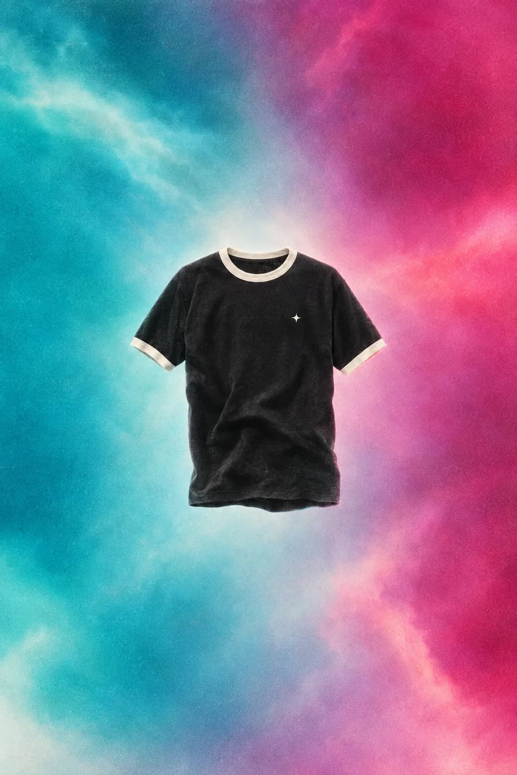 A single black ringer tee floating alone on an aqua-to-magenta field — quantity one, no stack