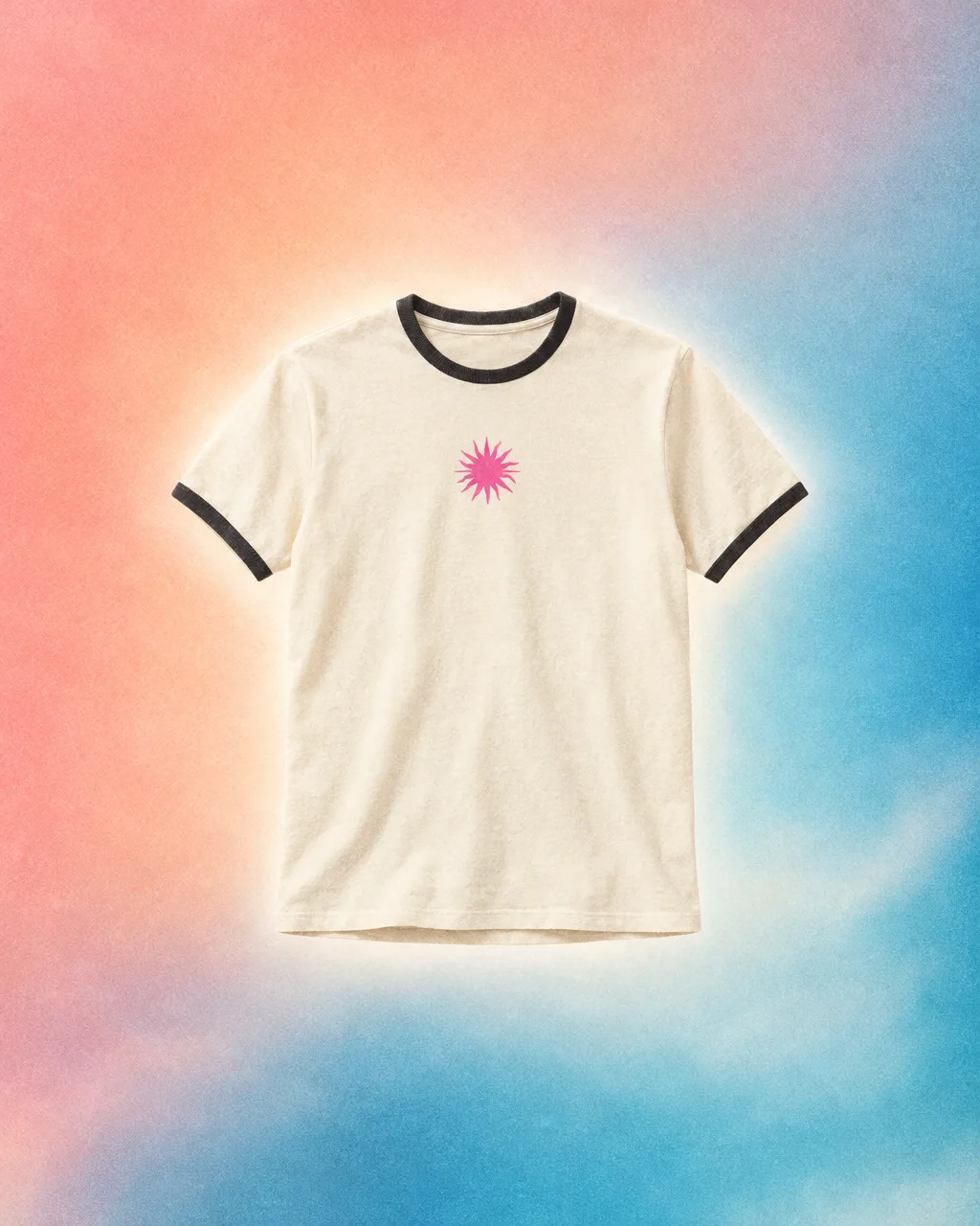 Cream ringer t-shirt with a pink sunburst print on a peach and ice-blue field