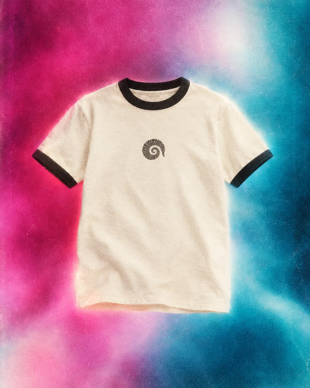 Cream ringer t-shirt with black trim and a charcoal ram-spiral print